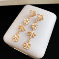 Gold Floral Branch Drop Earrings Statement Jewelry Design view 6