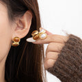 Oval Cabochon Pearl Look Border Gold Stud Earrings view 1