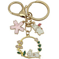 Cat Charm Keychains Featuring White Flower Across 19 Pictured Variations view 6