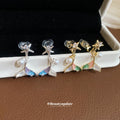 Mermaid Tail Pearl Drop Ear Clips in Gold and Silver view 2