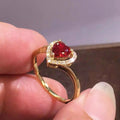 Red Heart-Shaped Solitaire Halo Ring In Polished Gold Tone view 2