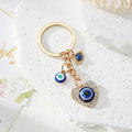 Gold Tone Blue Evil Eye Charm Keychains in Eight Designs view 4