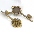 Ornate Key Shaped Round Pendant Bezel Settings in Three Finishes view 4