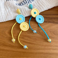 Blue Flower and Button Drop Earrings in Two Playful Styles view 7