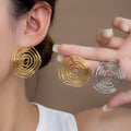 Gold and Silver Open Spiral Round Statement Stud Earrings view 1