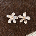 Brushed Five Petal Flower Stud Earrings in Gold and Silver view 7