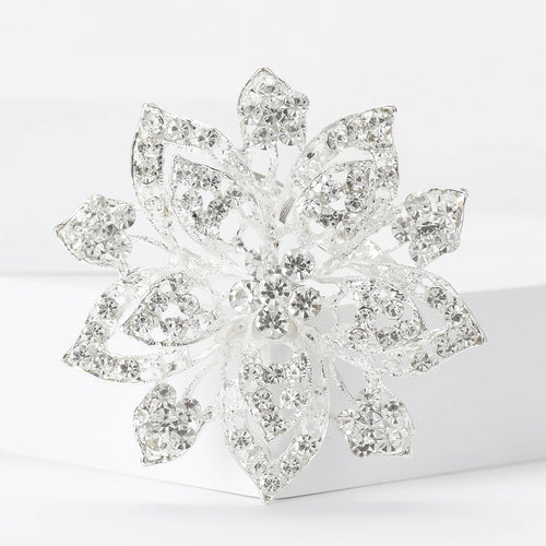 Angled display of large layered flower with pointed crystal-set petals