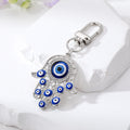 Gold and Silver Tone Enamel Hamsa Hand Evil Eye Clip Keychains in Four Designs view 4