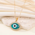Gold Tone Crystal Evil Eye Pendant Necklaces in Two Designs view 4