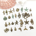 Yellow Starfish and Seahorse Shell Charms for Jewelry and Craft Projects view 1