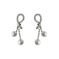 Silver Tone Clear Stone Knot And Double White Pearl Tassel Earrings view 5