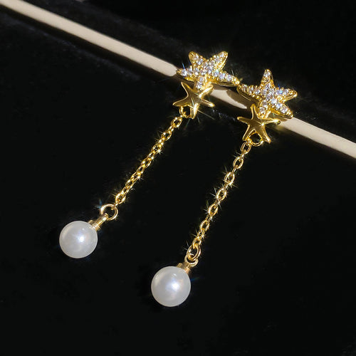 Crystal Star Stud Earrings with Long Pearl Chain Drops in modeled view