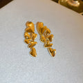 Gold Tone Cascading Leaf Stud Earrings with Polished Metal Finish view 3