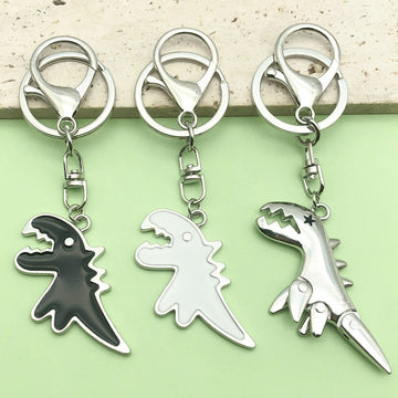 Dinosaur Charm Keychains Featuring Articulated Dinosaur Across 6 Pictured Variations
