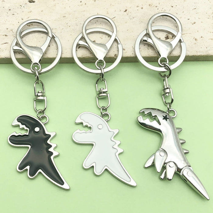 Dinosaur Charm Keychains Featuring Articulated Dinosaur Across 6 Pictured Variations