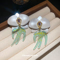 White Orchid Drop Earrings with Green Swallow Shaped Dangles view 2
