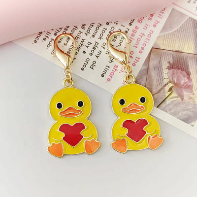 Main product view of yellow Heart-Holding Duck Lobster-Clasp Charm with Gold Tone Finish