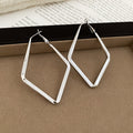 Angular Diamond Shaped Hoop Earrings In Two Sizes Matching Jewelry Pair view 8