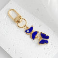 Gold Tone Evil Eye Charm Keychain with Blue Tassel and Rhinestone Accents view 10