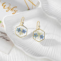 Gold Tone Blue Pressed Flower Drop Earrings in Three Geometric Shapes view 3