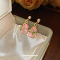 Gold Tone Pink Gourd Pearl Drop Earrings with Leaf Detail view 4
