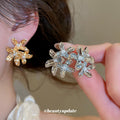 Sculpted Flower Stud Earrings in Gold and Silver Tones view 2