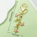 Starfish, Conch and Shell Charm Keychains Featuring Starfish, Conch Across 64 Variations view 10