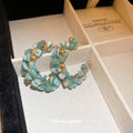 Blue Beaded Crescent Hoop Stud Earrings in Gold Tone view 1