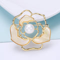 Openwork Camellia Brooch With White Pearl and Gold Tone Petals view 1