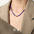 Blue Faceted Bead Necklace Gold Crystal Ring Red Accents view 1