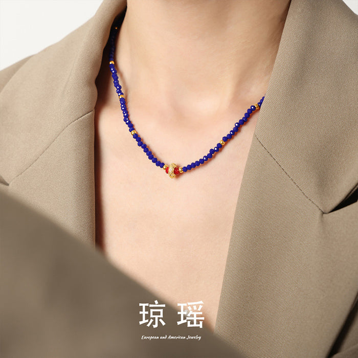 Blue Faceted Bead Necklace Gold Crystal Ring Red Accents