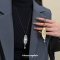 Leaf Pendant Cord Necklace in Gold Tone or Silver Tone view 1