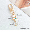 White Enamel Butterfly Evil Eye Letter Charm Gold Keychain view 2