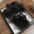 Large Black Feather Hair Claw With Sequin Bow And Loose Strands view 2