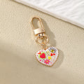 Gold Tone Small Printed Heart Evil Eye Clip Keychains in Six Designs view 4