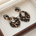 Nine Leopard Print Heart Round and Diamond Earrings view 9