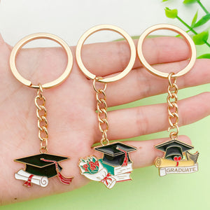 Graduation Charm Keychains Featuring Graduation Cap Across 31 Pictured Variations