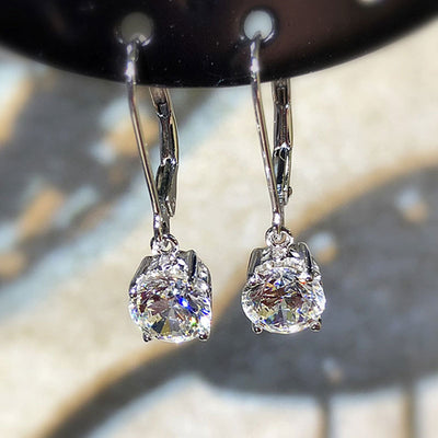 Front view of round crystal leverback drop earrings in silver tone