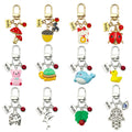 Dolphin and Turtle Charm Keychains Featuring Dolphin Across 7 Pictured Variations view 1