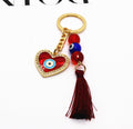 Gold Tone Red Evil Eye Heart Bead and Tassel Keychains view 4