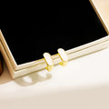Gold Mini Hoop Stud Earrings Black White Oval Enamel Inlay view 6