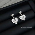 Silver Heart Angel Relief Drop Stud Earrings Matching Pair view 1