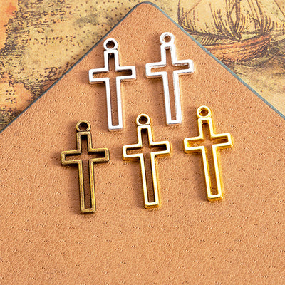Open Outline Cross Alloy Pendant Charm displayed in a grouped product arrangement