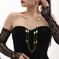 Long Gold Station Necklace White Sea Shell and Metal Discs view 3