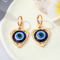 Heart Evil Eye Huggie Drop Earrings in Gold and Silver Tone view 1