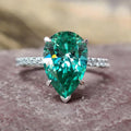 Green Pear-Shaped Solitaire Pave Ring In Polished Silver Tone view 1