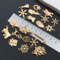 Gold-Tone Snowflake and Bell Metal Charms with 26 Listed Options view 2