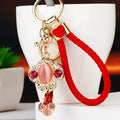 Jeweled Moonstone Ruyi Keychains with Braided and Bare Wrist Loops view 10