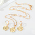 Gold Tone Embossed Cherub Coin Necklace and Huggie Earrings view 5
