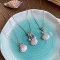 Pink Shell Pendant Necklaces with Silver Tone Ocean Charms in Three Styles view 4